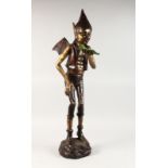 AN AMUSING STANDING BRONZE FIGURE OF A PIXIE HOLDING A LEAF. 39ins high.