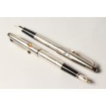 A VERY GOOD PAIR OF MONTBLANC AQUAMARINE STONE TOPAZ PENS.