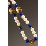 A LAPIS AND PEARL GOLD BRACELET.