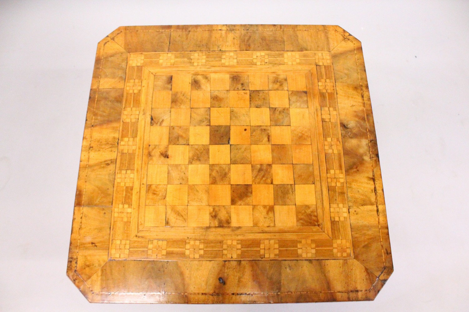 A 19TH CENTURY WALNUT TRIPOD TABLE, with chessboard inlaid top, on a tripod base. 2ft 0ins wide x - Image 2 of 5