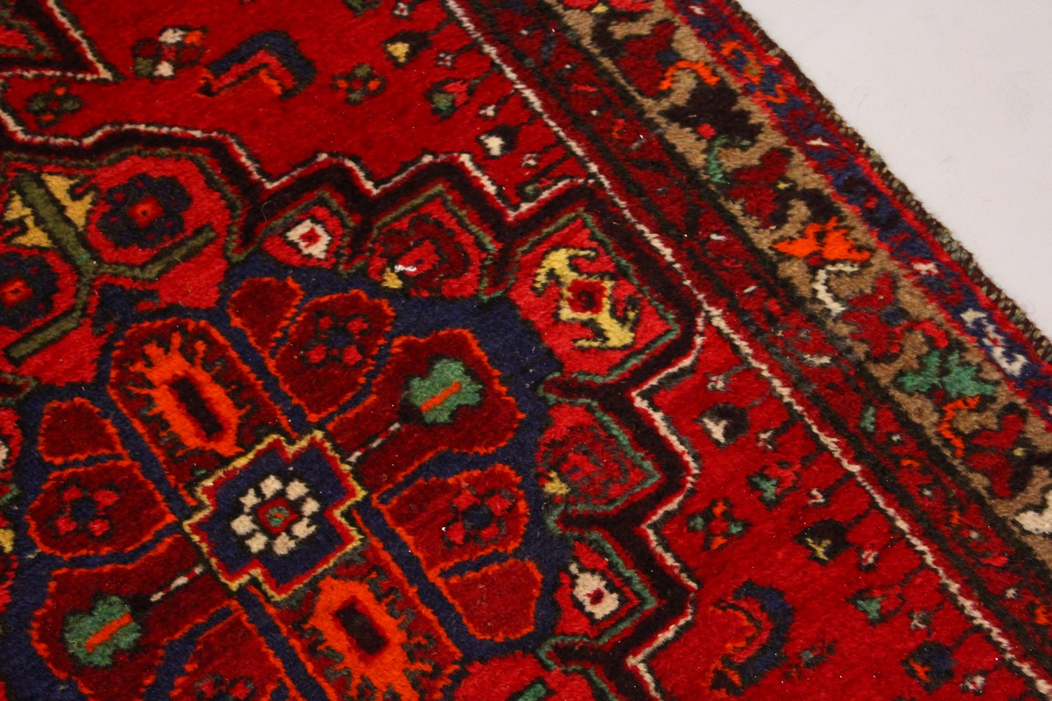 A PERSIAN RUG, with central motif and red ground. 7ft 2ins x 3ft 4ins. - Image 2 of 7