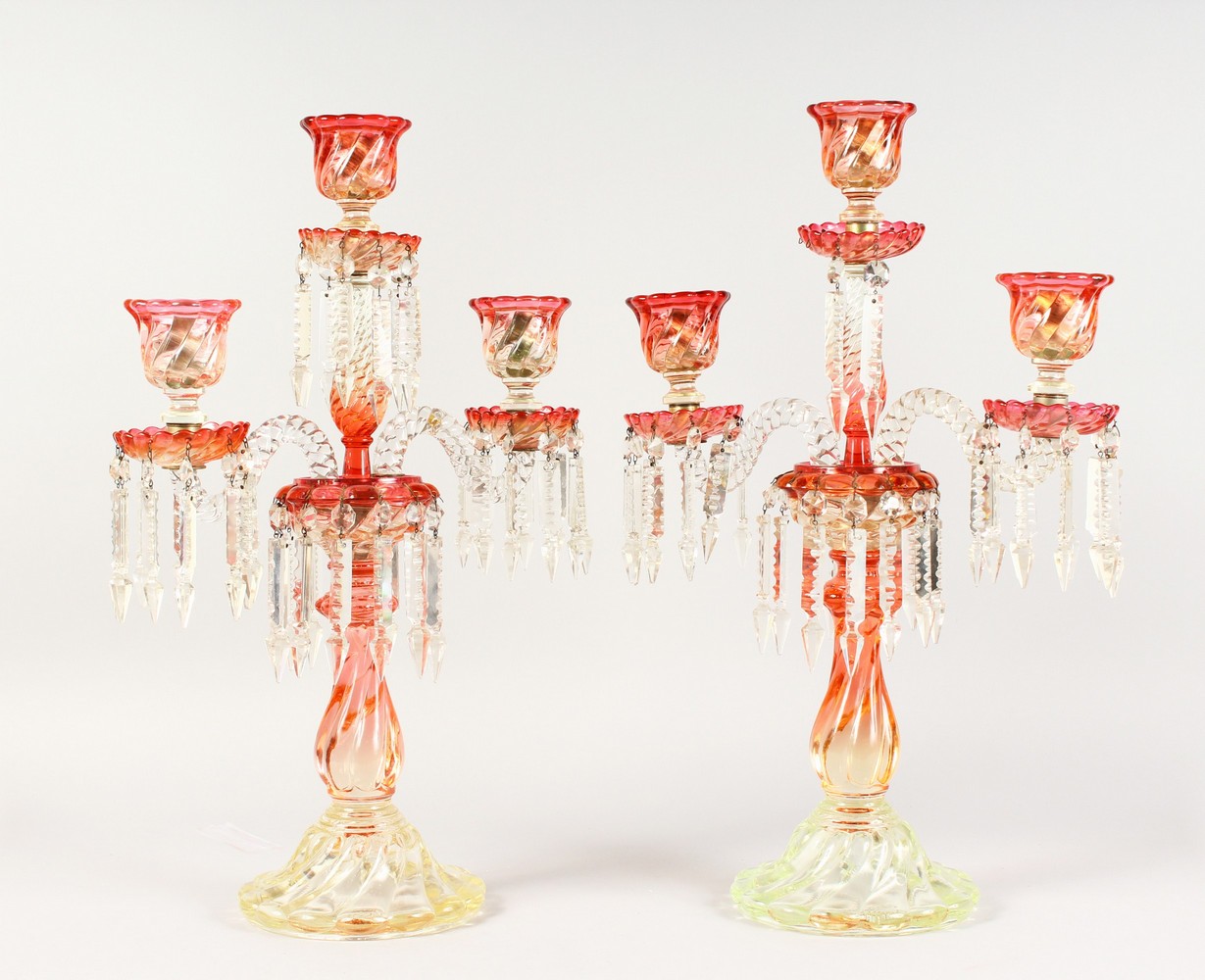 A SUPERB PAIR OF BACCARAT TWO-COLOUR GLASS TABLE CANDELABRA, with three candle sconces, pair of