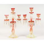 A SUPERB PAIR OF BACCARAT TWO-COLOUR GLASS TABLE CANDELABRA, with three candle sconces, pair of