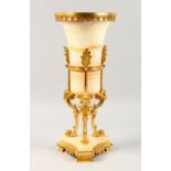 A GOOD FRENCH ONYX AND ORMOLU LAMP, with satyr masks, acanthus and triangular base. 18ins high.