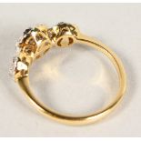 AN 18CT YELLOW GOLD DIAMOND THREE PANELLED CLUSTER RING of 3/4 of a carat.
