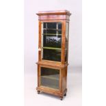 A 19TH CENTURY MAHOGANY AND ORMOLU DISPLAY CABINET, in two parts, each having a single glazed door