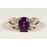 A 9CT GOLD, AMETHYST AND DIAMOND RING.