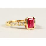 A RUBY AND DIAMOND 18CT GOLD RING.