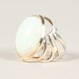 A SILVER AND OPAL RING.