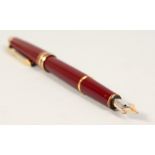 A MONT BLANC MAROON PEN.