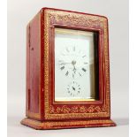 A VERY GOOD FRENCH BRASS CARRIAGE CLOCK by CHAUDE, PARIS. 5ins high, in a red leather case.