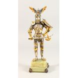 A LIMITED EDITION SILVERED AND GILT METAL MODEL OF A KNIGHT IN ARMOUR, on an onyx base. 10.5ins