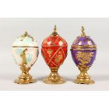 HOUSE OF FABERGE. THREE SMALL PORCELAIN URNS AND COVERS. 5.5ins high.