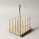 A CHRISTOPHER DRESSER DESIGN TOAST RACK.