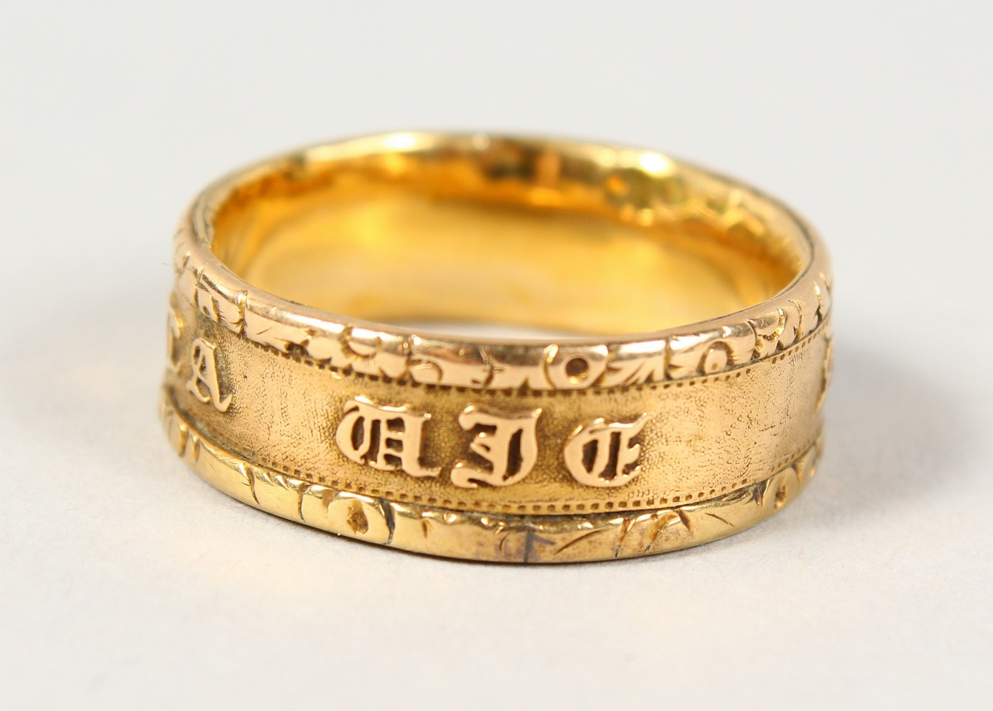 A 22CT GOLD WEDDING BAND, another gold ring with an inscription (2). - Image 6 of 11