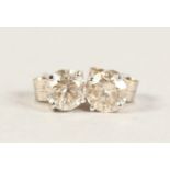 A PAIR OF WHITE GOLD DIAMOND STUD EARRINGS of 85 points approx.