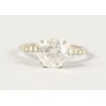 A GOOD SINGLE STONE DIAMOND RING of 2cts, set in 18ct white gold.