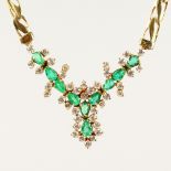AN 18CT YELLOW GOLD, EMERALD AND DIAMOND NECKLACE.