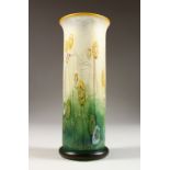 A VERY GOOD "WILD GARDEN" ISLE OF WIGHT STUDIO GLASS VASE, painted with flowers. 9ins high.