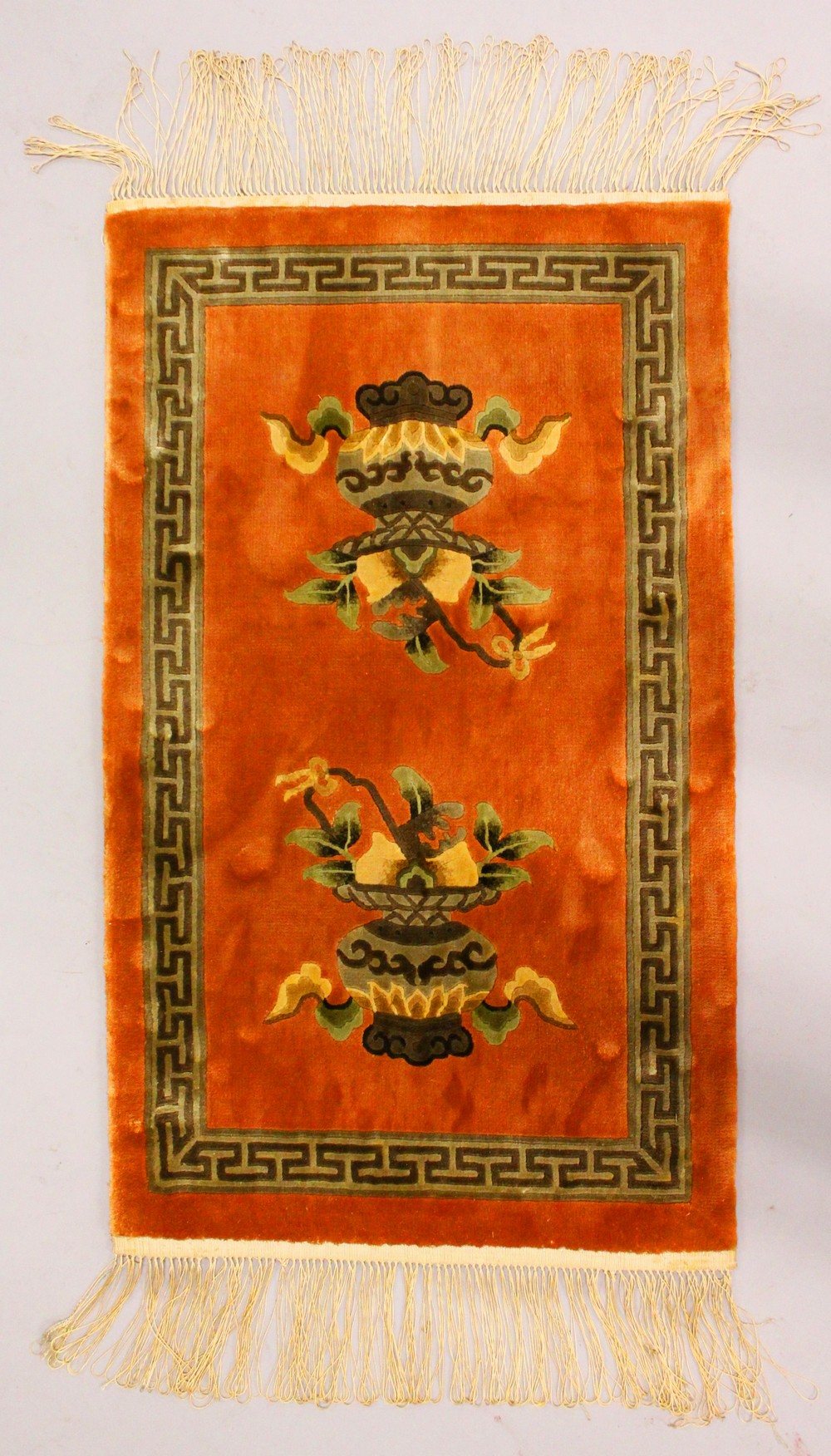 A CHINESE RUG, rust ground decorated with two urns; together with a Chinese mat. 2ft 7ins x 1ft - Image 2 of 4