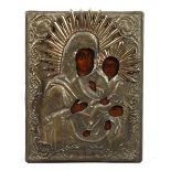 A RUSSIAN ICON, Madonna and Child, with engraved inscription. 8ins x 6.5ins.