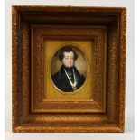 PORTRAIT HEAD AND SHOULDERS OF A VICTORIAN GENTLEMAN, in a dark coat and cravat, oval, 3ins x 2.