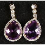 A PAIR OF 18CT YELLOW GOLD, PEAR SHAPED AMETHYST AND DIAMOND DROP EARRINGS of 6.4cts.