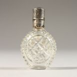 A SILVER TOP GLASS SCENT BOTTLE. 2.25ins long.