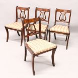 A SET OF FOUR REGENCY STYLE MAHOGANY DINING CHAIRS, with lyre backs and drop-in seats.