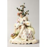 A GOOD CONTINENTAL MEISSEN DESIGN OVAL GROUP, a young man and lady, a lamb on his knee, on an oval