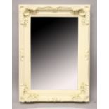 A CREAM FRAMED MIRROR. Mirrored Panel. 2ft x 3ft.