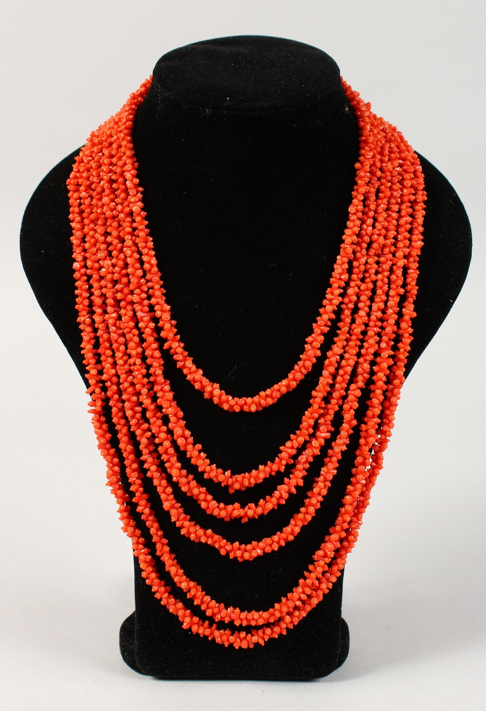 A SIX-STRAND CORAL NECKLACE.