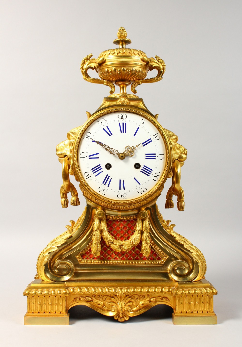 A GOOD 18TH CENTURY FRENCH ORMOLU CLOCK, with blue and white circular dial, eight-day movement