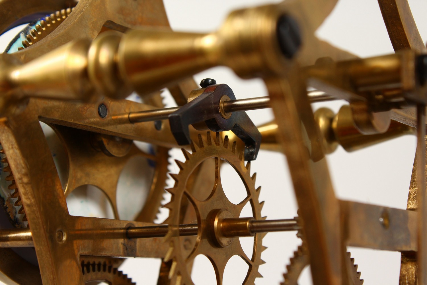 A MOON PHASE SKELETON CLOCK in a glass case. 17.5ins high including case. - Image 8 of 10