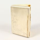 A RUSSIAN SILVER CIGARETTE CASE, with engraved decoration. 4.5ins high x 3.5ins wide