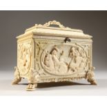 A SUPERB 19TH CENTURY EUROPEAN IVORY CASKET, the side panels carved with classical scenes, supported