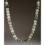 A LARGE JADE BEAD NECKLACE. 9ins long.