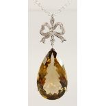 AN 18CT WHITE GOLD, DIAMOND AND SUBSTANTIAL CITRINE PENDANT NECKLACE.