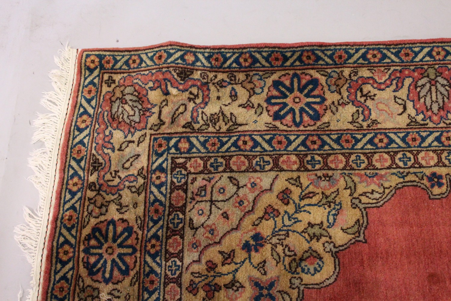 A PERSIAN CARPET, with rose ground, central motif, motifs to the border. 7ft 2ins x 7ft 4ins. - Image 4 of 10
