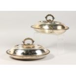 A PAIR OF OVAL ENTREE DISHES, COVERS AND HANDLES with stag crest.