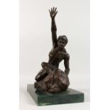 AN ABSTRACT BRONZE MODEL OF A MAN, arms held aloft, on a marble base. 13ins high.