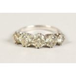 AN 18CT WHITE GOLD FIVE STONE DIAMOND RING of 3.34cts.