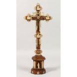 A 19TH CENTURY OLIVE WOOD AND MOTHER-OF-PEARL RELIQUARY CRUCIFIX. 14.5ins high.