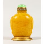 A CHINESE YELLOW SNUFF BOTTLE. 2.75ins long.