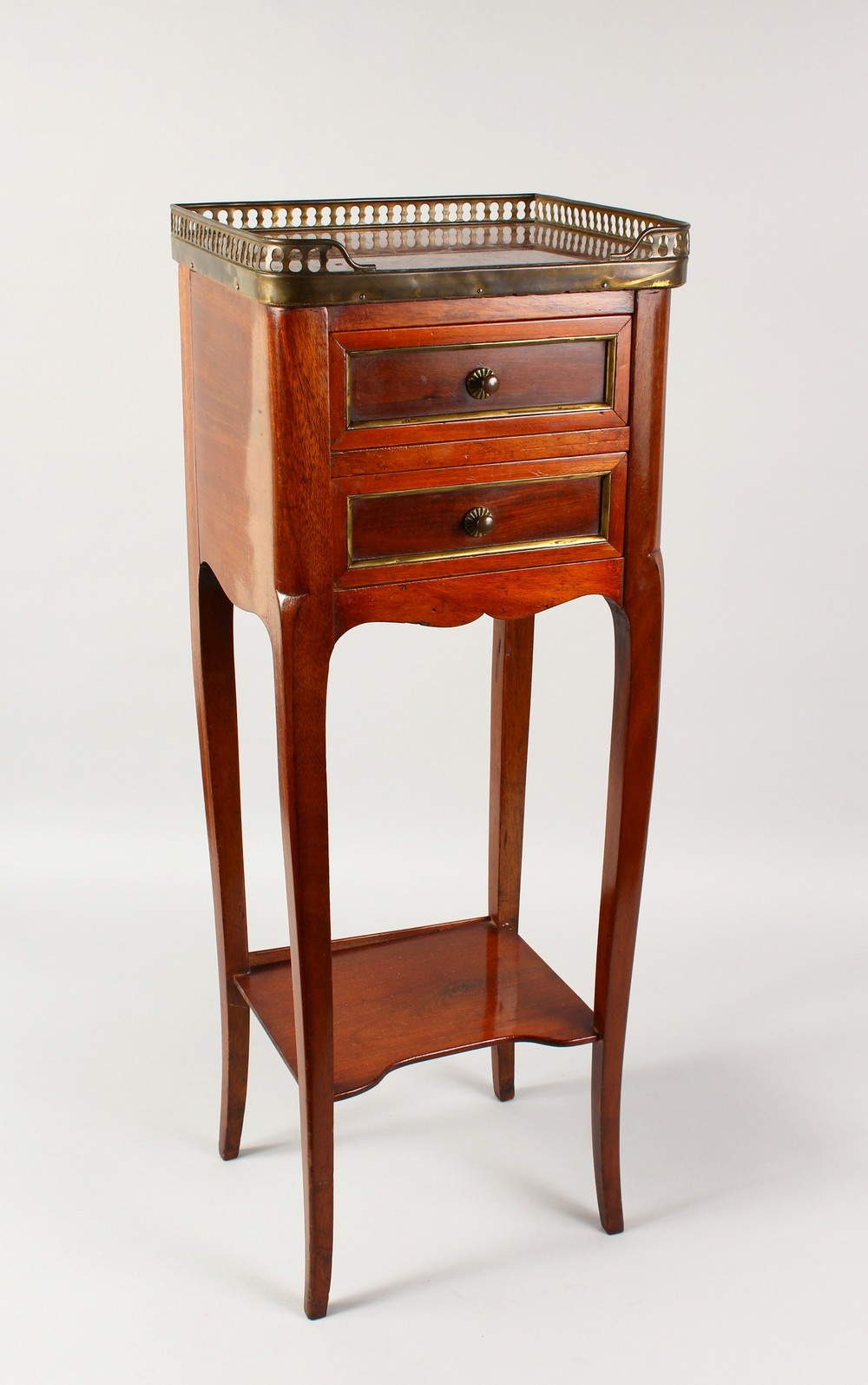 A LATE 19TH CENTURY FRENCH MAHOGANY MARBLE TOP TWO DRAWER PETIT COMMODE, the slender legs united