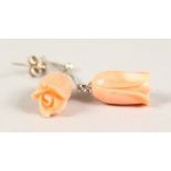 A PAIR OF CARVED CORAL EARRINGS.