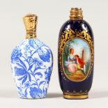 TWO GOLD TOP PORCELAIN SCENT BOTTLES.