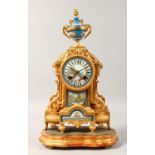 A 19TH CENTURY FRENCH PORCELAIN AND GILT METAL CLOCK, in the SEVRES manner, with painted face and