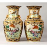 A LARGE PAIR OF ORIENTAL STYLE VASES, with blue ground and scenes of figures on horseback with dogs.