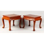 A PAIR OF SMALL CHINESE HARDWOOD STOOLS. 1ft 4ins wide x 1ft 2ins high x 1ft 1ins deep.